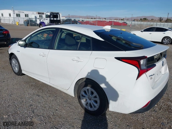 2021 Toyota Prius L Eco with VIN JTDKAMFU9M3150667, listed as a IAAI auction lot 41609328 with 59,177 mi miles. Bid and sale history available at carsss.com. Image 3.