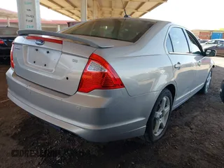 2010 Ford Fusion SE with VIN 3FAHP0HA0AR219074, listed as a IAAI auction lot 42040384 with 135,435 mi miles and . Bid and sale history available at carsss.com. Image 4.