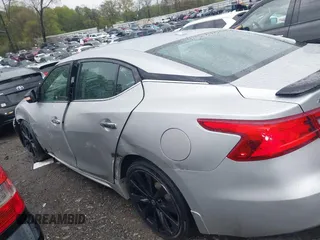 2017 Nissan Maxima SR with VIN 1N4AA6AP2HC396545, listed as a IAAI auction lot 41910588 with 142,661 mi miles and . Bid and sale history available at DreamBid. Image 14.