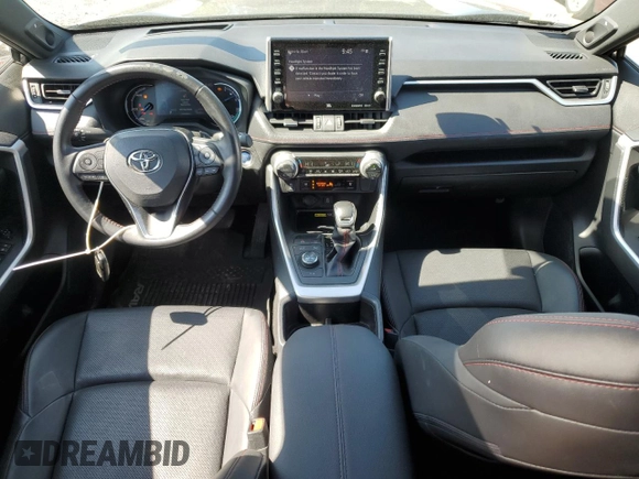 2022 Toyota RAV4 XSE with VIN JTMFB3FV9ND101157, listed as a Copart auction lot 59044315 with 54,591 mi miles and Salvage title. Bid and sale history available at DreamBid. Image 8.
