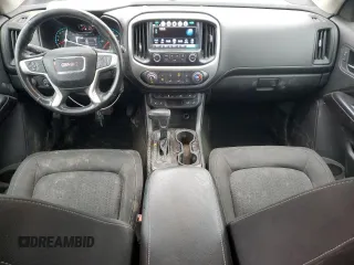 2018 GMC Canyon 4WD SLE z VIN 1GTG6CEN4J1100617, wystawiony jako Copart lot #53282695 z przebiegiem 112 033 mil mil oraz Szkoda całkowita • Salvage title. Historia ofert i sprzedaży dostępna na DreamBid. Obrazek 8.