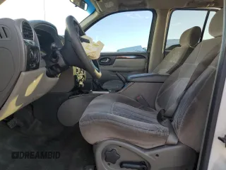 2003 GMC Envoy SLT with VIN 1GKDT13S232405530, listed as a Copart auction lot 45555865 with 138,680 mi miles and Salvage Title. Bid and sale history available at carsss.com. Image 7.