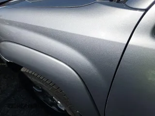 2015 Toyota Tacoma with VIN 3TMLU4EN1FM194654, listed as a IAAI auction lot 42213204 with 209,016 mi miles and . Bid and sale history available at DreamBid. Image 1.