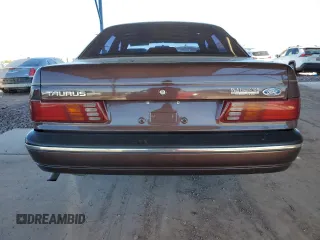 1988 Ford Taurus LX with VIN 1FABP5345JG210480, listed as a Copart auction lot 50248585 with 47,172 mi miles and Salvage Title. Bid and sale history available at carsss.com. Image 6.