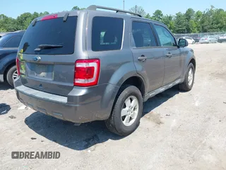 2011 Ford Escape XLT with VIN 1FMCU9D79BKC11522, listed as a IAAI auction lot 42844398 with 223,666 mi miles and . Bid and sale history available at DreamBid. Image 4.