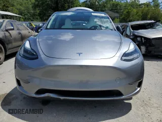 2024 Tesla Model Y Long Range z VIN 7SAYGDEE7RA308338, wystawiony jako Copart lot #61137375 z przebiegiem 19 501 mil mil oraz Szkoda całkowita • Salvage title. Historia ofert i sprzedaży dostępna na DreamBid. Obrazek 5.