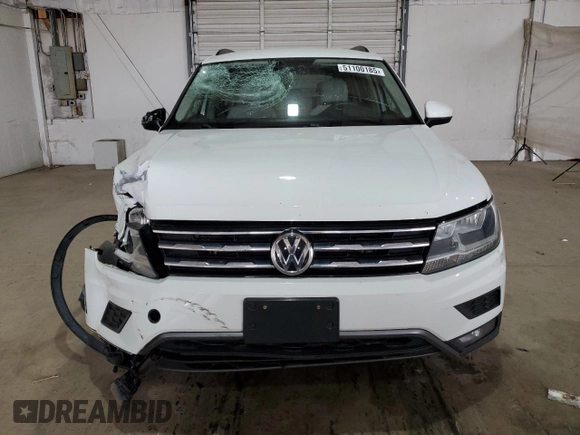 2018 Volkswagen Tiguan S z VIN 3VV0B7AXXJM010176, wystawiony jako Copart lot #51100185 z przebiegiem 84 032 mil mil oraz Szkoda całkowita • Salvage title. Historia ofert i sprzedaży dostępna na DreamBid. Obrazek 5.