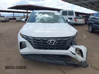 2022 Hyundai Tucson SEL z VIN 5NMJF3AE2NH062926, wystawiony jako IAAI lot #41969902 z przebiegiem 41 882 mil mil oraz . Historia ofert i sprzedaży dostępna na DreamBid. Obrazek 12.
