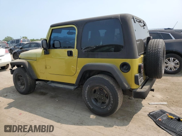 2003 Jeep Wrangler Sahara with VIN 1J4FA59S03P313418, listed as a Copart auction lot 64883094 with 184,658 mi miles and Salvage title. Bid and sale history available at DreamBid. Image 2.