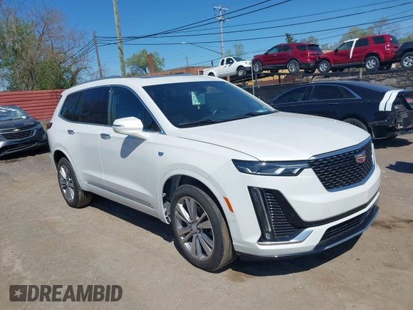 2023 Cadillac XT6 AWD Premium Luxury z VIN 1GYKPDRS4PZ182799, wystawiony jako IAAI lot #42161097 z przebiegiem 22 776 mil mil oraz . Historia ofert i sprzedaży dostępna na DreamBid. Obrazek 1.
