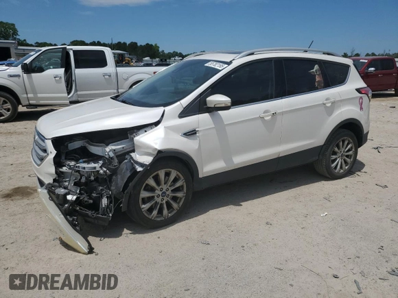 2018 Ford Escape Titanium with VIN 1FMCU0J99JUA06741, listed as a Copart auction lot 55782195 with 103,392 mi miles and Salvage title. Bid and sale history available at DreamBid. Image 1.