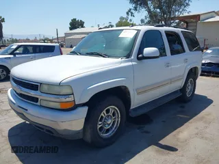 2004 Chevrolet Tahoe LS with VIN 1GNEC13T64R292075, listed as a IAAI auction lot 42138343 with 236,054 mi miles. Bid and sale history available at carsss.com. Image 2.