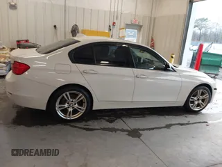 2014 BMW 3 Series 328i xDrive with VIN WBA3B5C53EP543964, listed as a IAAI auction lot 41856923 with 149,440 mi miles. Bid and sale history available at carsss.com. Image 13.
