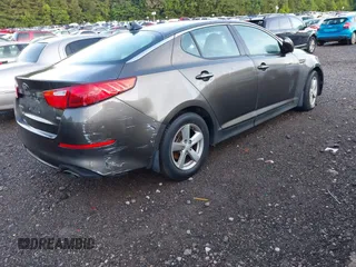 2015 Kia Optima LX z VIN 5XXGM4A79FG397995, wystawiony jako IAAI lot #42175785 z przebiegiem 159 239 mil mil oraz . Historia ofert i sprzedaży dostępna na DreamBid. Obrazek 4.