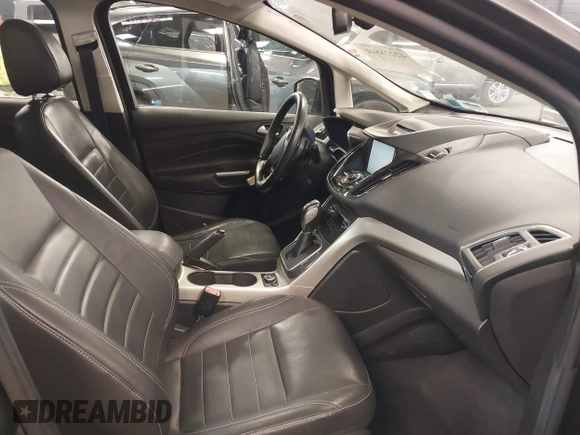 2013 Ford C-Max SEL z VIN 1FADP5BU9DL531704, wystawiony jako IAAI lot #42228841 z przebiegiem 91 808 mil mil oraz . Historia ofert i sprzedaży dostępna na DreamBid. Obrazek 5.