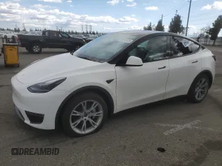 2023 Tesla Model Y Long Range z VIN 7SAYGDEE3PF916132, wystawiony jako Copart lot #51645625 z przebiegiem 28 238 mil mil oraz Szkoda całkowita • Salvage title. Historia ofert i sprzedaży dostępna na DreamBid. Obrazek 1.