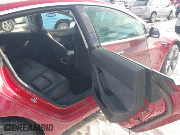 2018 Tesla Model 3 Long Range Battery with VIN 5YJ3E1EB0JF064041, listed as a IAAI auction lot 41562239 with 54,720 mi miles and . Bid and sale history available at DreamBid. Image 8.