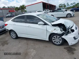 2015 Hyundai Accent GLS with VIN KMHCT4AE9FU808981, listed as a IAAI auction lot 41930246 with 160,406 mi miles. Bid and sale history available at carsss.com. Image 6.
