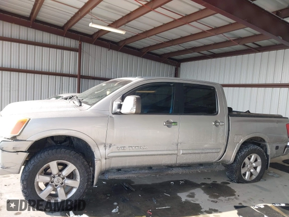2011 Nissan Titan SL with VIN 1N6AA0EC7BN306488, listed as a IAAI auction lot 41413618 with 102,465 mi miles. Bid and sale history available at carsss.com. Image 14.