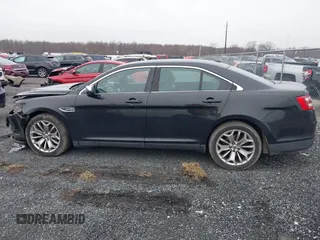 2014 Ford Taurus Limited with VIN 1FAHP2F81EG113984, listed as a IAAI auction lot 41542792 with 213,206 mi miles. Bid and sale history available at carsss.com. Image 15.