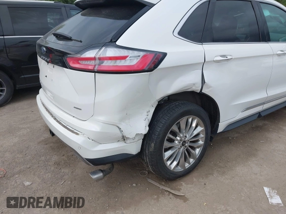 2021 Ford Edge Titanium with VIN 2FMPK4K96MBA18546, listed as a IAAI auction lot 42584326 with 65,214 mi miles and . Bid and sale history available at DreamBid. Image 6.