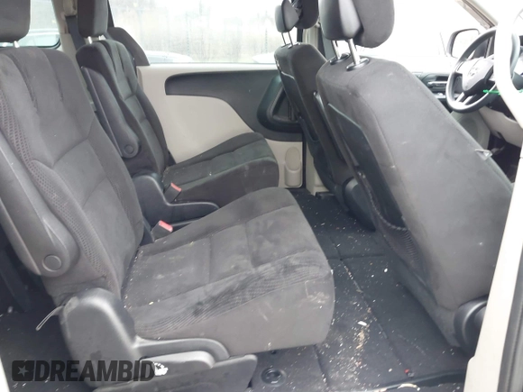 2014 Dodge Grand Caravan American Value with VIN 2C4RDGBG9ER463136, listed as a IAAI auction lot 41968032 with 184,138 mi miles and . Bid and sale history available at DreamBid. Image 8.