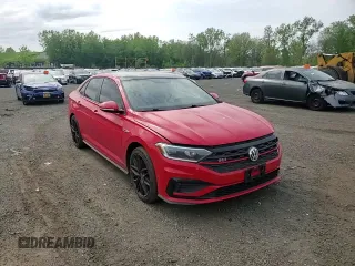 2019 Volkswagen Jetta GLI S z VIN 3VW5T7BU5KM148082, wystawiony jako Copart lot #56562505 z przebiegiem 100 026 mil mil oraz Szkody całkowita. Historia ofert i sprzedaży dostępna na DreamBid. Obrazek 13.