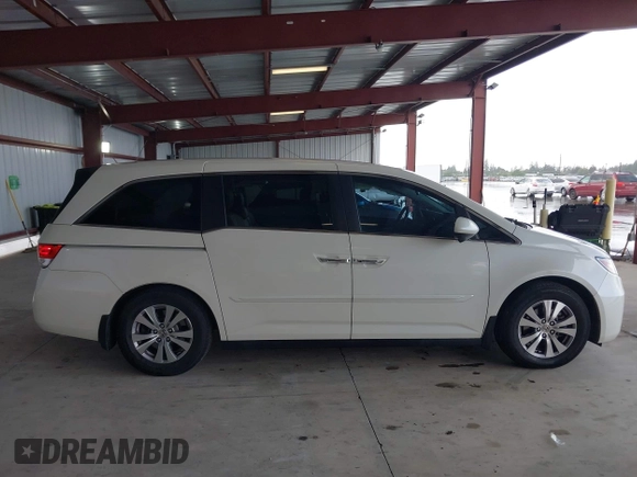 2015 Honda Odyssey EX-L with VIN 5FNRL5H64FB084175, listed as a IAAI auction lot 41943540 with 67,902 mi miles and . Bid and sale history available at carsss.com. Image 13.