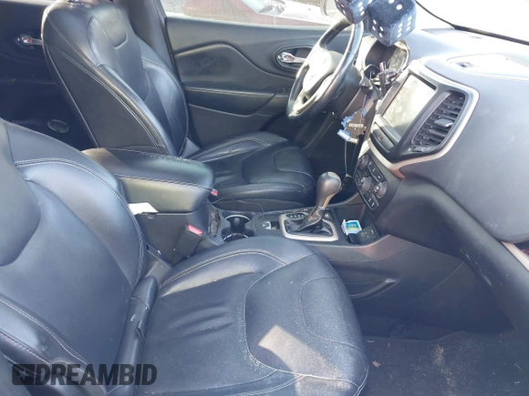 2014 Jeep Cherokee Limited with VIN 1C4PJLDS4EW223798, listed as a IAAI auction lot 41792052 with 227,690 mi miles and . Bid and sale history available at DreamBid. Image 5.
