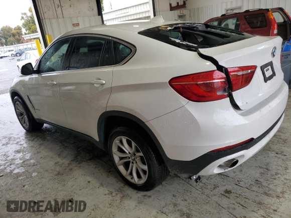 2015 BMW X6 sDrive35i with VIN 5UXKU0C50F0F91865, listed as a Copart auction lot 82128374 with 122,395 mi miles and Salvage Title. Bid and sale history available at carsss.com. Image 2.