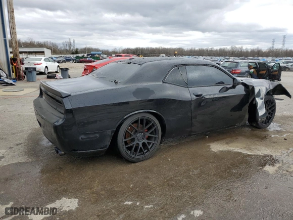 2013 Dodge Challenger R/T with VIN 2C3CDYBT9DH558815, listed as a Copart auction lot 47601315 with 124,098 mi miles and Salvage Title. Bid and sale history available at carsss.com. Image 3.