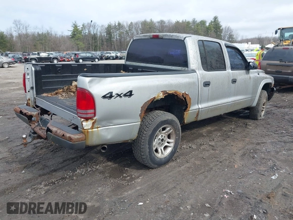 2004 Dodge Dakota Sport with VIN 1D7HG38K54S634958, listed as a IAAI auction lot 41831018 with 135,917 mi miles. Bid and sale history available at carsss.com. Image 4.
