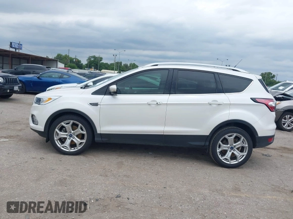 2018 Ford Escape Titanium with VIN 1FMCU0J96JUD36806, listed as a IAAI auction lot 42198506 with 50,710 mi miles and . Bid and sale history available at DreamBid. Image 14.