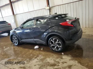 2018 Toyota C-HR XLE z VIN NMTKHMBX0JR041387, wystawiony jako Copart lot #57050385 z przebiegiem Nie podano mil oraz Szkody całkowita. Historia ofert i sprzedaży dostępna na DreamBid. Obrazek 2.