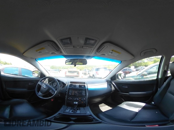 2015 Mazda CX-9 Touring with VIN JM3TB2CA2F0451180, listed as a IAAI auction lot 42180078 with 112,804 mi miles and . Bid and sale history available at carsss.com. Image 18.