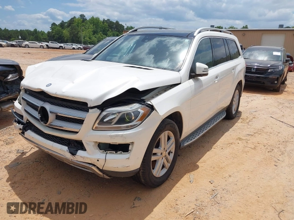 2014 Mercedes-Benz GL 450 z VIN 4JGDF7CE2EA287810, wystawiony jako IAAI lot #39696896 z przebiegiem 181 816 mil mil oraz . Historia ofert i sprzedaży dostępna na DreamBid. Obrazek 18.