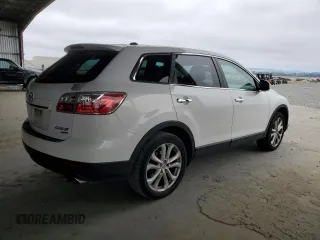 2012 Mazda CX-9 Grand Touring with VIN JM3TB3DV2C0336355, listed as a Copart auction lot 61687975 with 150,580 mi miles and Salvage title. Bid and sale history available at DreamBid. Image 3.