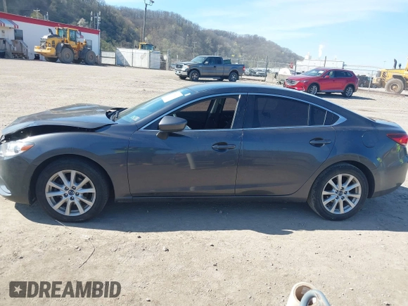 2016 Mazda 6 i Sport with VIN JM1GJ1U54G1413244, listed as a IAAI auction lot 42062416 with 148,970 mi miles and . Bid and sale history available at DreamBid. Image 14.