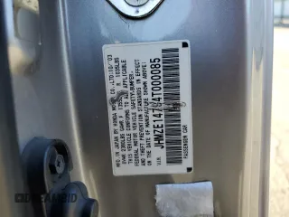 2004 Honda Insight z VIN JHMZE14794T000085, wystawiony jako Copart lot #74238984 z przebiegiem 165 012 mil mil oraz Szkoda całkowita • Salvage title. Historia ofert i sprzedaży dostępna na DreamBid. Obrazek 14.