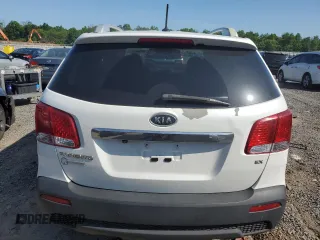 2013 Kia Sorento EX z VIN 5XYKUDA64DG319554, wystawiony jako Copart lot #62086745 z przebiegiem 166 793 mil mil oraz Czysty tytuł • Clean title. Historia ofert i sprzedaży dostępna na DreamBid. Obrazek 6.