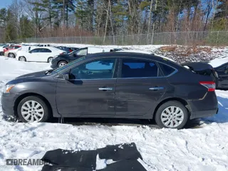 2015 Nissan Sentra SV with VIN 3N1AB7AP0FY318544, listed as a IAAI auction lot 41445593 with 140,588 mi miles. Bid and sale history available at carsss.com. Image 14.