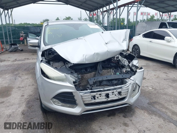 2013 Ford Escape SEL z VIN 1FMCU9H97DUA34665, wystawiony jako IAAI lot #42258567 z przebiegiem 174 227 mil mil oraz . Historia ofert i sprzedaży dostępna na DreamBid. Obrazek 12.
