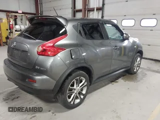 2011 Nissan Juke SL with VIN JN8AF5MV1BT028708, listed as a IAAI auction lot 42001833 with 167,580 mi miles. Bid and sale history available at carsss.com. Image 4.