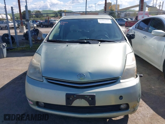 2007 Toyota Prius z VIN JTDKB20U877556527, wystawiony jako IAAI lot #41965245 z przebiegiem 259 572 mil mil oraz . Historia ofert i sprzedaży dostępna na DreamBid. Obrazek 12.