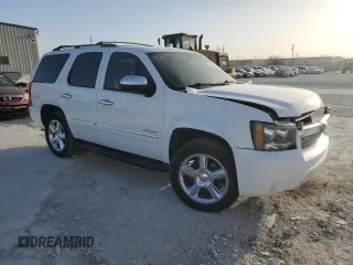 2013 Chevrolet Tahoe LTZ with VIN 1GNSCCE08DR102648, listed as a Copart auction lot 49677345 with 226,528 mi miles and Salvage title. Bid and sale history available at DreamBid. Image 4.