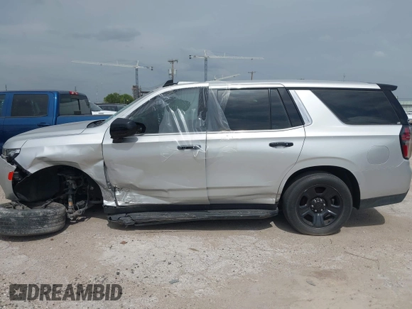 2022 Chevrolet Tahoe Commercial with VIN 1GNSCLED4NR254074, listed as a IAAI auction lot 42524415 with Not provided miles and . Bid and sale history available at DreamBid. Image 13.