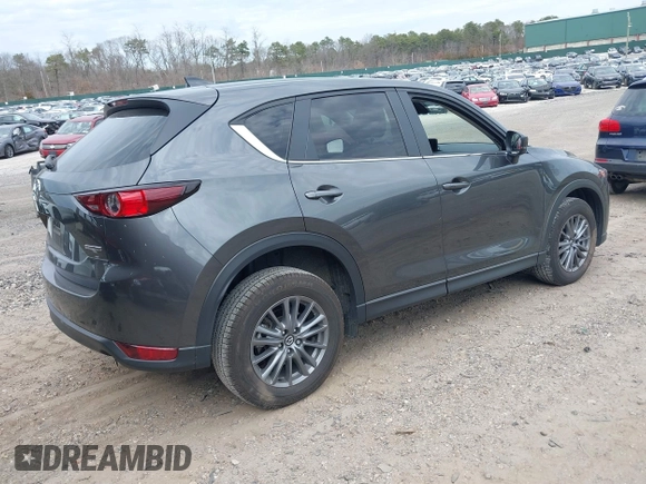 2021 Mazda CX-5 Touring with VIN JM3KFBCM8M0492145, listed as a IAAI auction lot 39077248 with 20,408 mi miles. Bid and sale history available at carsss.com. Image 4.