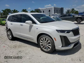 2020 Cadillac XT6 FWD Premium Luxury z VIN 1GYKPCRS7LZ235645, wystawiony jako Copart lot #58977995 z przebiegiem 42 504 mil mil oraz Nie do naprawy • Non repairable. Historia ofert i sprzedaży dostępna na DreamBid. Obrazek 4.