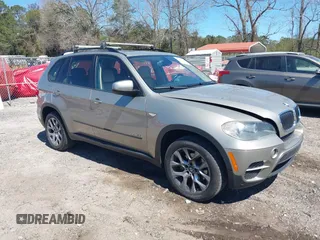 2011 BMW X5 35i with VIN 5UXZV4C57BL415565, listed as a IAAI auction lot 41864490 with 176,458 mi miles. Bid and sale history available at carsss.com. Image 1.