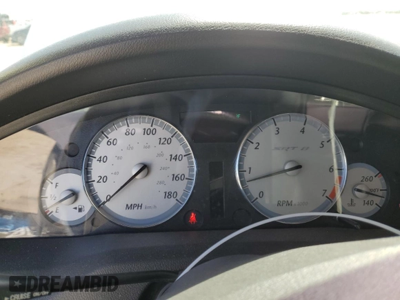 2006 Chrysler 300 C SRT8 with VIN 2C3KA73W76H101950, listed as a Copart auction lot 48501125 with 144,696 mi miles and Salvage Title. Bid and sale history available at carsss.com. Image 9.